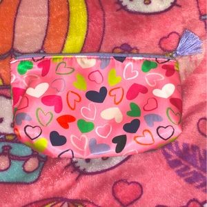 pink and purple heart makeup bag with tassel